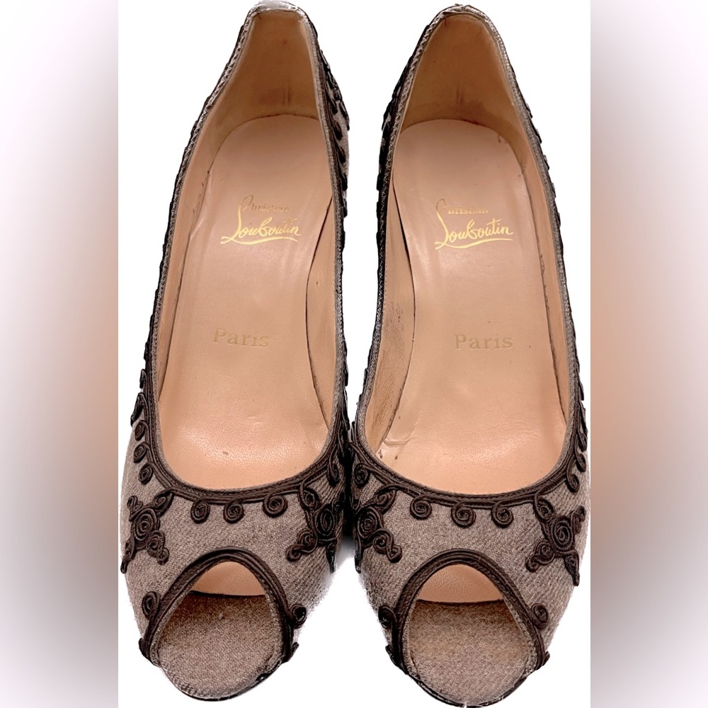 Christian Louboutin brown pumps.